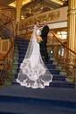 Trumpet/Mermaid V-neck Stretch Crepe Sweep Train Wedding Dresses With Appliques Lace