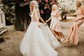 Ball Gown/Princess V-neck Tulle Sweep Train Wedding Dresses With Appliques Lace