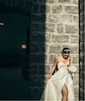 A-line V-neck Satin Sweep Train Ruffles Wedding Dresses