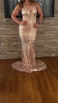 Trumpet/Mermaid Sweep Train V-neck Sequined Prom Dresses