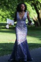 Trumpet/Mermaid Sweep Train V-neck Sequined Prom Dresses