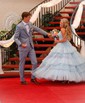 Ball Gown V-neck Glitter Tulle Ruffle Tiered Prom Dresses
